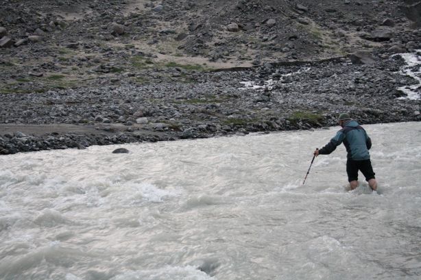 Mike attempts to cross the glacial stream