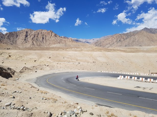 Jessica climbing in the sun