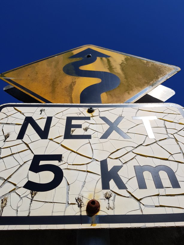 Withered signpost along the Colo River